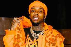 . @torylanez asks fans to help pick from three albums Photograph