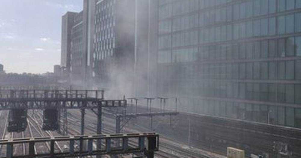 Fire crews rush to Paddington Station as smoke seen pouring from building Photograph