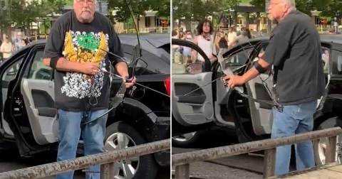 US man aims bow and arrow at Utah protesters #georgefloydprotests Photograph