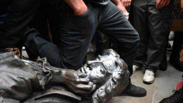 Statue of slave trader removed by #BlackLivesMatter protesters in Bristol  Photograph