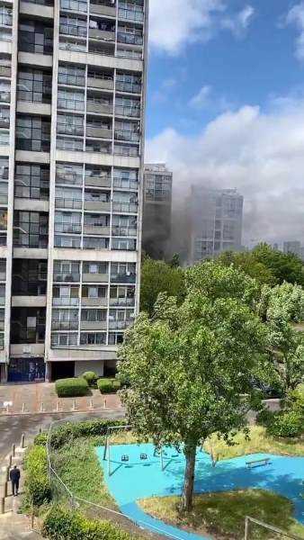  60 firefighters tackle blaze at high-rise block of flats in Kennington  Photograph