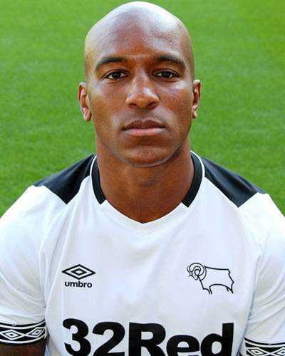 Derby County's Andre Wisdom stabbed and robbed as he visited family member Photograph
