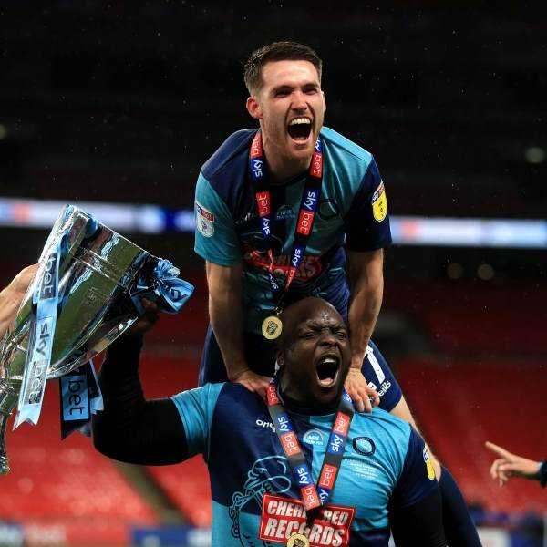 Wycombe Wanderers secure promotion to the Championship, Akinfenwa celebrates in style with Klopp Photograph