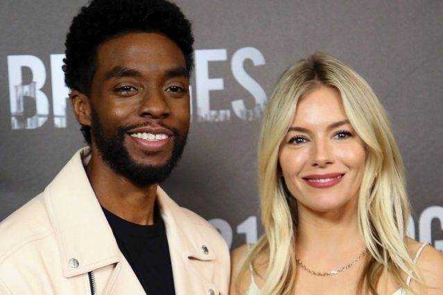 Sienna Miller says Chadwick Boseman gave up part of his salary to boost her pay for "21 Bridges" Photograph